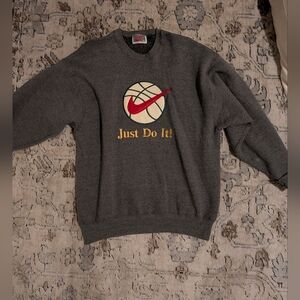 Nike Dark Gray Crewneck Sweater with Red and Gold Accents